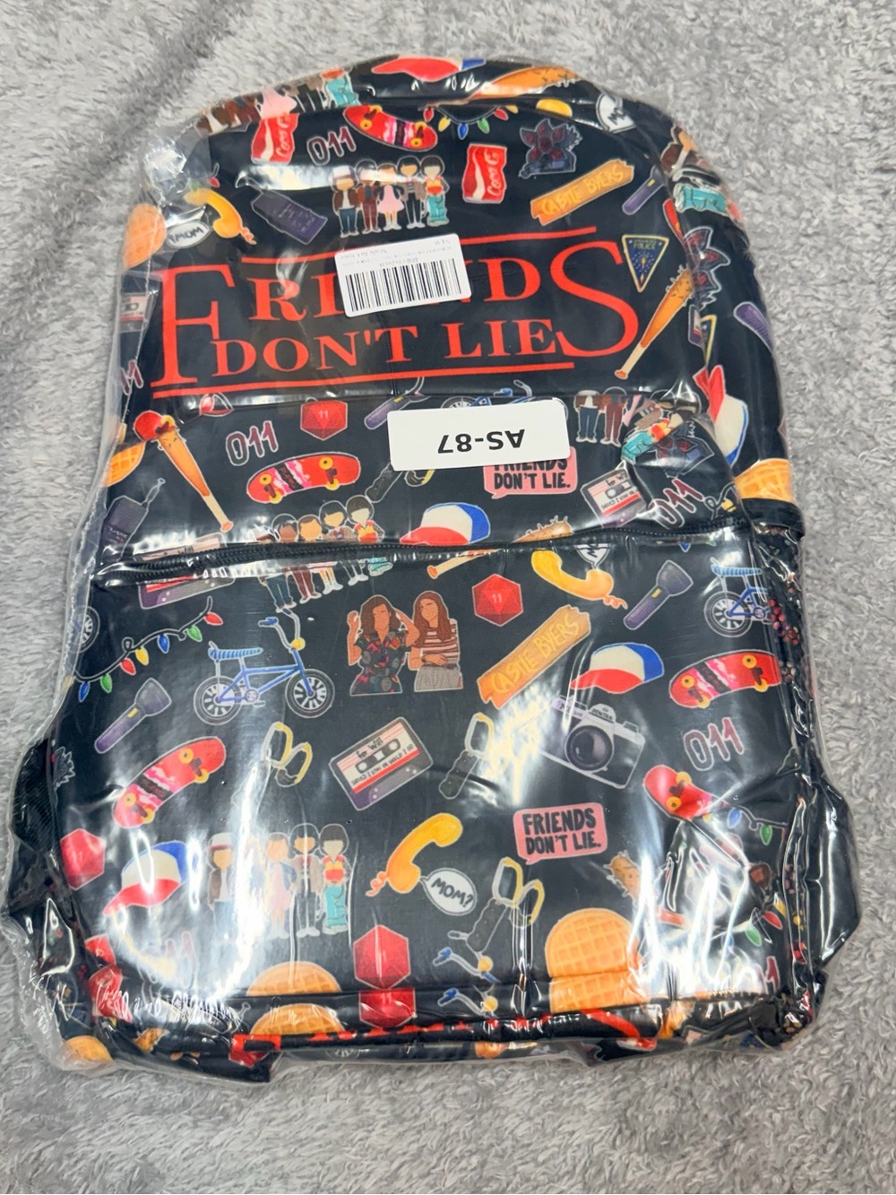 Stranger Things“Friends Don't Lie” Backpack - Black Patterned